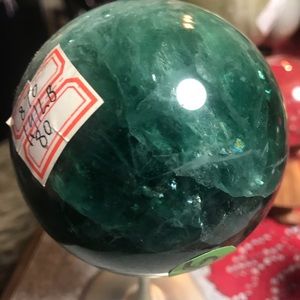 Deep green fluorite sphere